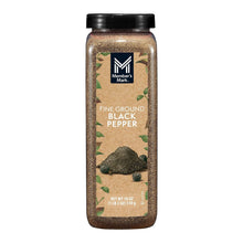 Fine ground black pepper bottle with dark cap and front label