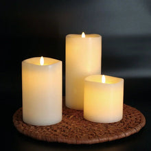 Flameless LED wax candles set of 3, three ivory pillar candles with glowing tips
