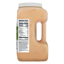 Creamy beige Italian dressing bottle with Nutrition Facts label and side handle