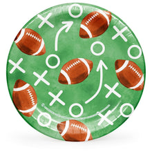 Football-themed paper plate with green background, footballs, arrows, and Xs pattern