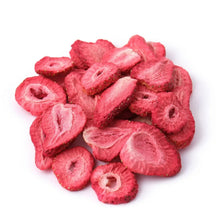 Freeze-dried strawberry slices pile, pink slices in a heap