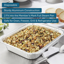 Disposable aluminum steam table pan filled with baked casserole
