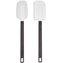 Two scrapers with white flat blades and dark handles, rectangular scrapers heads