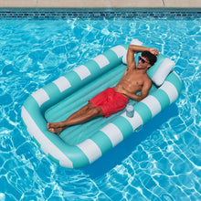 Inflatable sun tub with blue and white striped rim and blue water basin, on pool