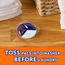 Detergent Power Pacs unit in clear wrapper, blue and purple