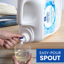 Laundry detergent jug with easy-pour spout, pouring clear liquid into cup.