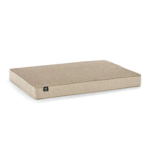 Beige pet lounger bed with low rectangular cushion and fabric cover