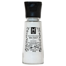 Mediterranean sea salt grinder with black top and clear glass jar