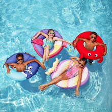 Purple animal ring float with face design, surrounded by pool water