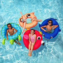 Orange and pink animal ring float with face design, held in pool water
