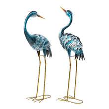 Metal crane statues set of 2, blue and silver cranes shown from side view.