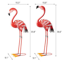Two red metal flamingo statues on circular bases, shown with size measurements