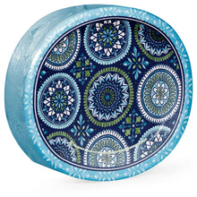Oval paper plate with blue and green mosaic medallion pattern and light blue rim