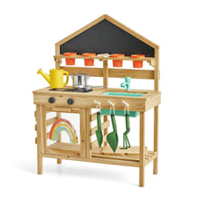 Wooden mud kitchen playset with raised tabletop, chalkboard panel, pots, and sink