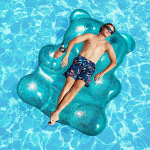 Teal oversized inflatable pool float shaped like a bear with side handles