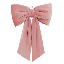 Oversized velvet bow decor in dusty pink velvet with flared side loops and tails