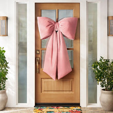 Oversized velvet bow decor in dusty pink with long hanging tails