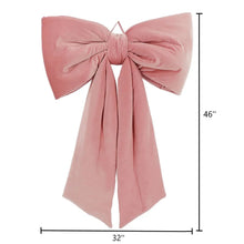 Oversized velvet bow decor with large pink bow and two long trailing ends