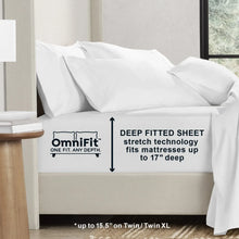 White solid sheet set fitted sheet on mattress with pillowcases