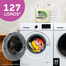 Lavender plant-based laundry detergent bottle on laundry machine with 127 loads label