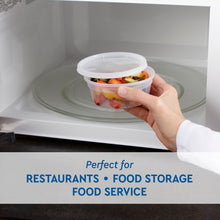 Translucent plastic deli container with lid being placed in microwave