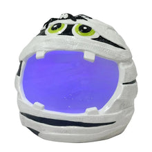 Ceramic mummy candy bowl with green-eyed face and purple glowing interior