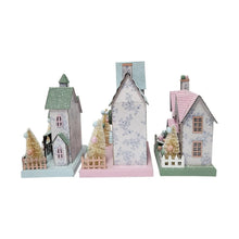 Set of 3 pre-lit paper houses with snowy speckled walls, pastel roofs, and tree decorations