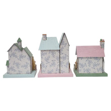 Set of 3 pre-lit paper houses with white speckled walls and mint, blue, and pink roofs