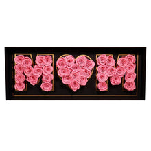 Preserved rose gift display box with pink roses spelling 'MOM' and heart