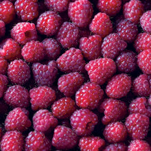 Fresh raspberries in a dense cluster, deep red-purple berries