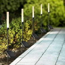 Set of five black LED solar landscape accent lights with square heads and spike stakes