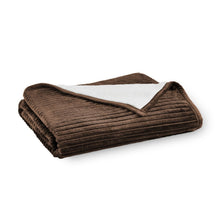 Ribbed throw blanket, folded dark brown with ribbed stripes and light border
