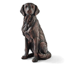 Bronze sitting dog statue with upright ears and realistic fur texture