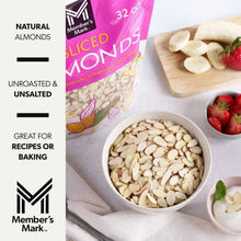 Sliced almonds pouch with a bowl of almond slices and strawberries nearby