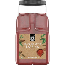 Spanish style paprika spice jar with black lid, filled with red ground paprika