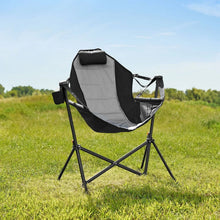 Swing lounger camp chair with black and light gray seat and back, on folding frame.