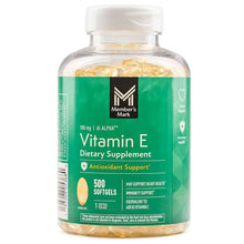 Vitamin E dietary supplement bottle with green label and 500 softgels visible