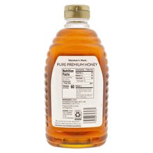 Wildflower honey bottle with back label and barcode, amber honey color