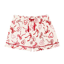 Pajama shorts with red bow print and elastic waistband, light fabric