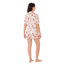 Women’s pajama set back view: short-sleeve top and elastic-waist shorts with red bow print