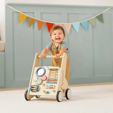 Wooden activity walker with front toy panel and steering handle; multi-shape parts