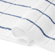 White bar mop with blue stitched border and looped texture detail