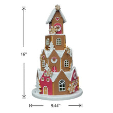 16-inch pre-lit gingerbread village ornament, height and base width shown on a house figure