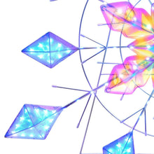 Close-up of color-changing snowflake LEDs on wire frame, glowing blue and purple