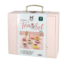 Packaged porcelain tea set in pink with butterfly-themed artwork and teapot illustration