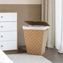 Woven laundry hamper with white liner and brown fabric on top, natural tan.
