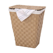 Woven laundry hamper with white liner and folded striped cloth on top, natural tan.