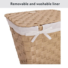 Handwoven laundry hamper with removable-looking white liner and cloth tie on the side