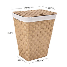 Handwoven laundry hamper in light tan with white liner and woven top mat