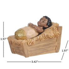 Wooden nativity baby figurine in cradle with cream and brown tones